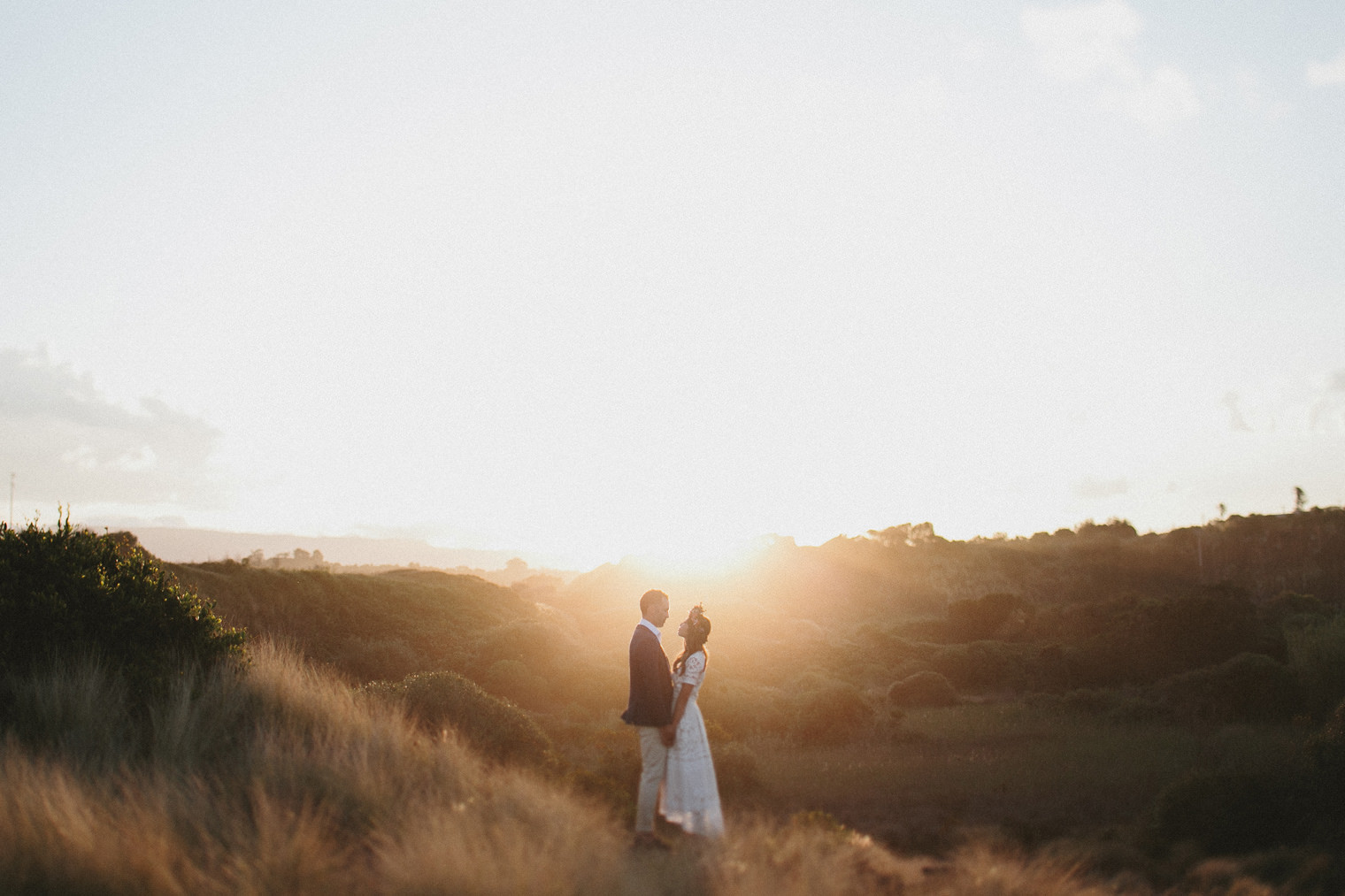 Couple on there wedding day at sunset 